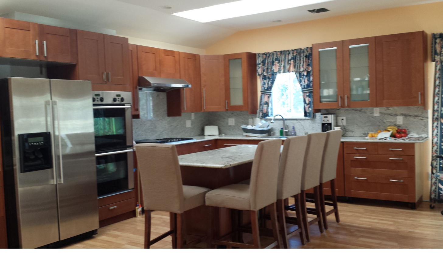 Equipped shared kitchen with granite island in CSULA student housing
